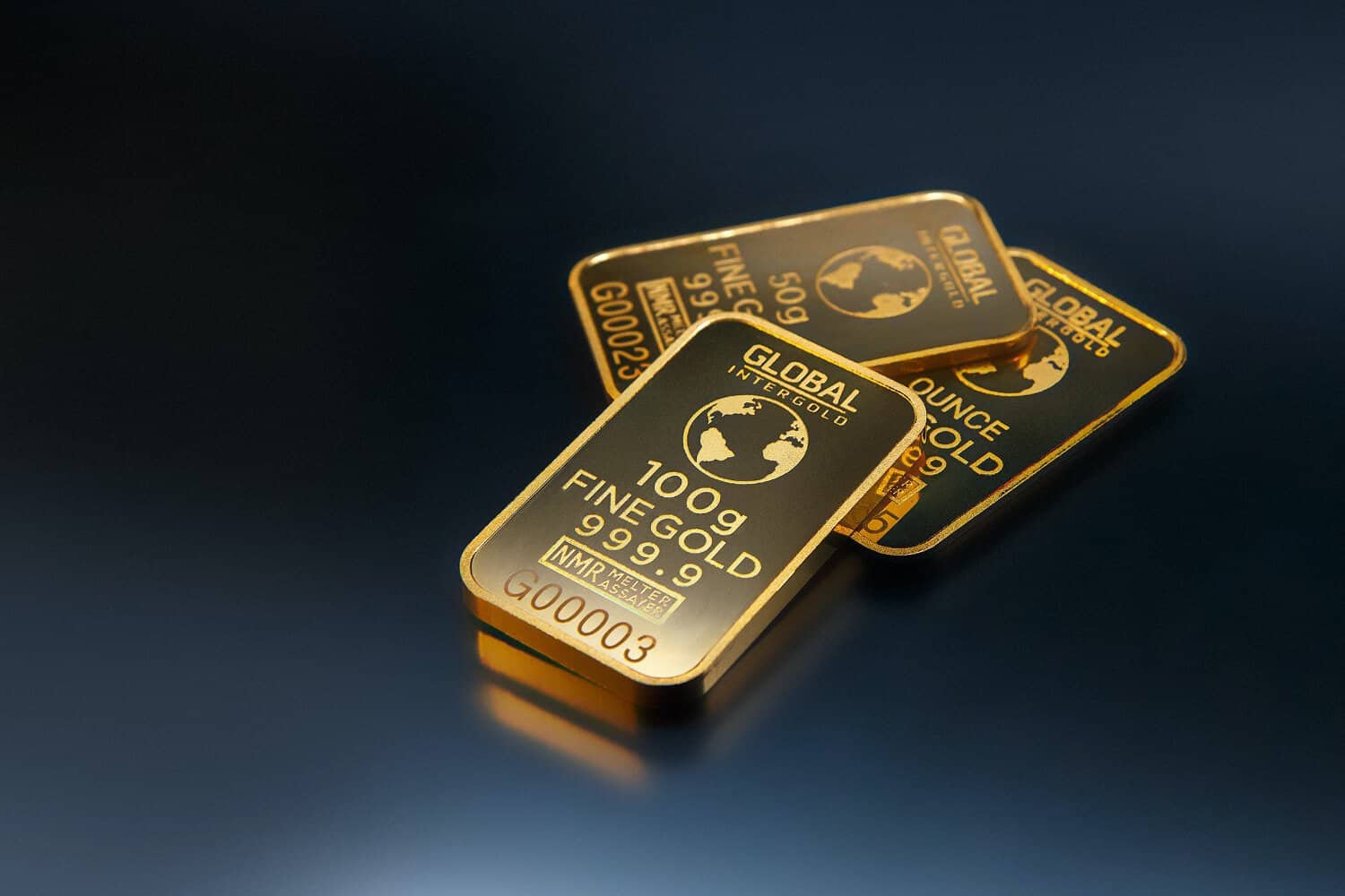 Gold bar sign with engraved details, ideal for branding and signage.