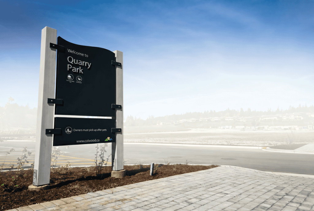 Durable monument sign with modern pylon design at Quarry Park entrance. Custom signage enhances visi.