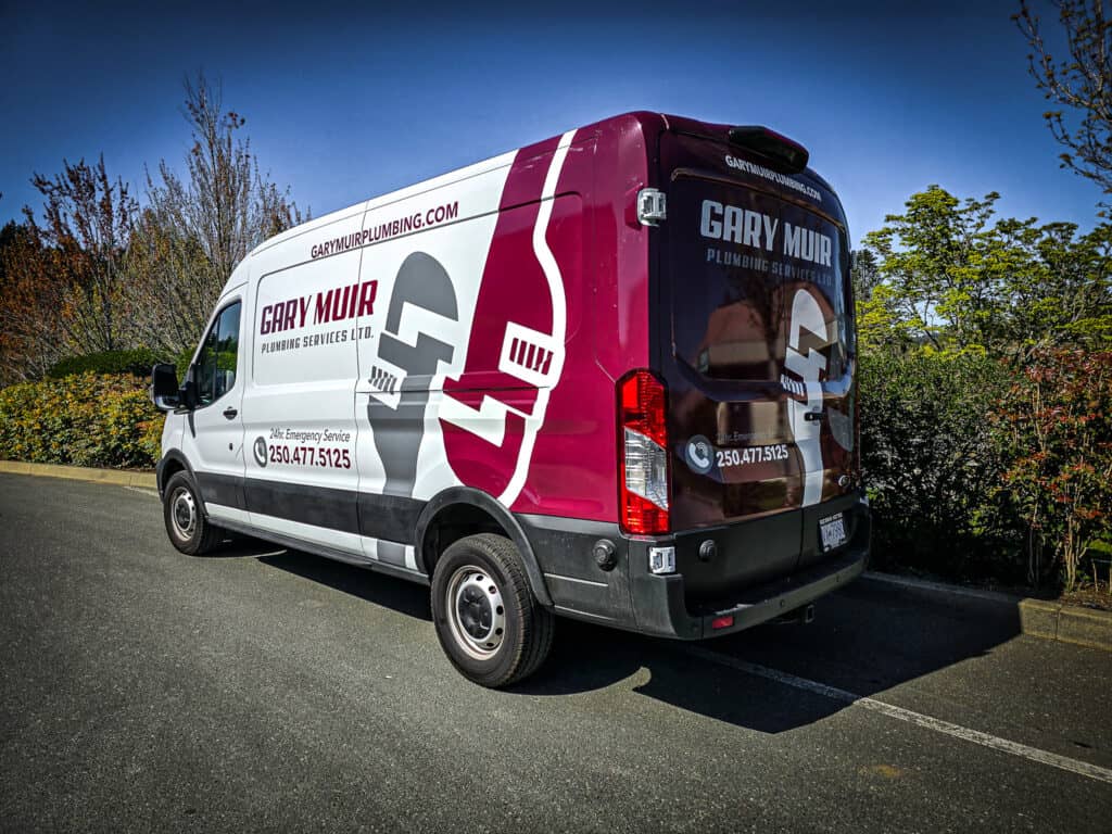 Custom plumbing service van with branded wraps in Victoria.