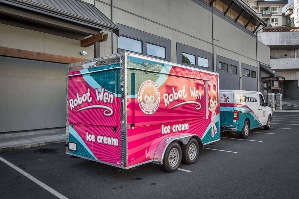 Robot Wen ice cream trailer with colorful branding and dual axles.