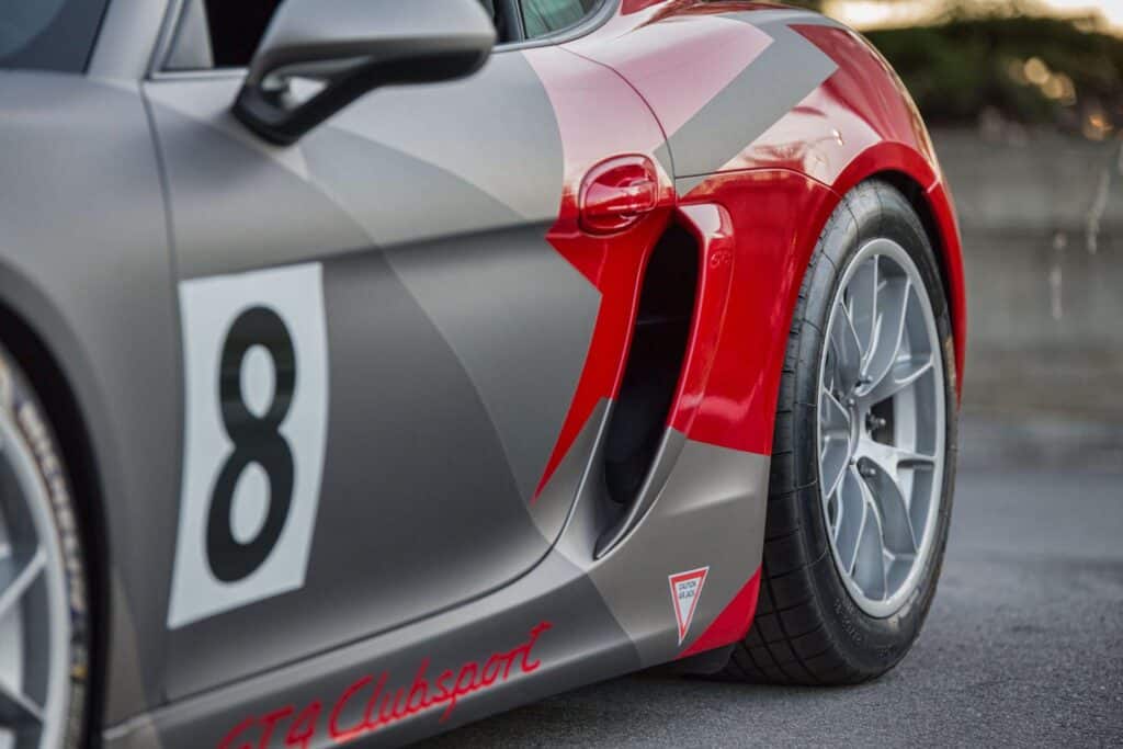 Custom race car wrap with bold graphics and racing number 8. Perfect for motorsport events and car e.