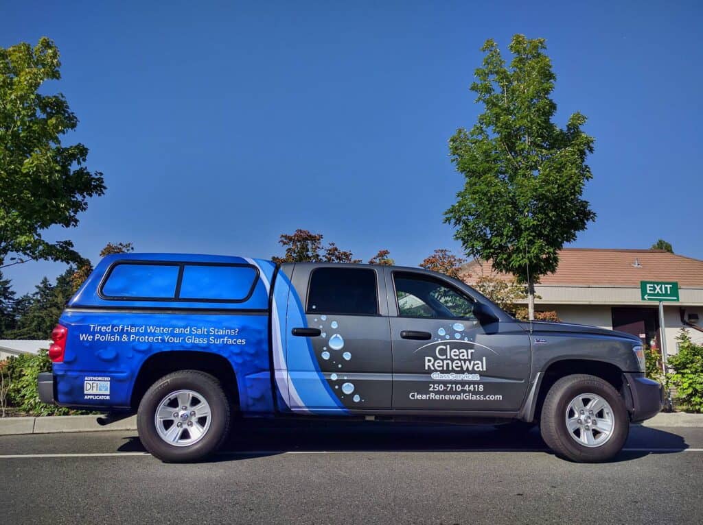 Vehicle wrap for Clear Renewal with water and salt stain design.