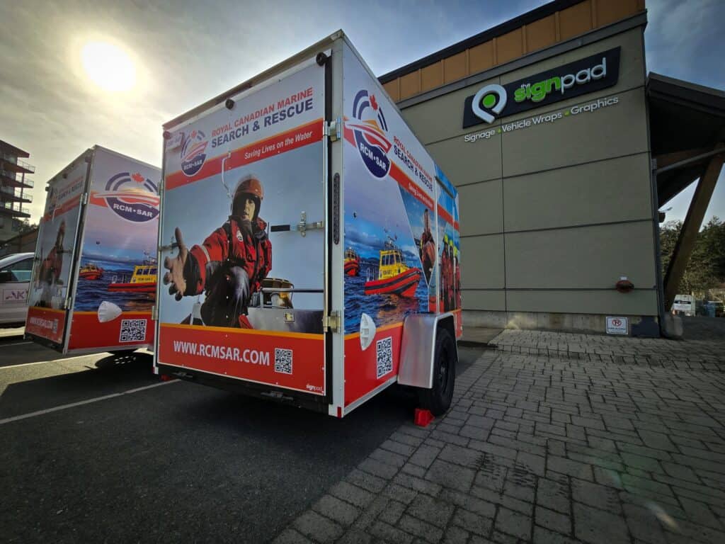 Search and Rescue vehicle wrap with marine rescue graphics and contact info. Perfect for emergency r.