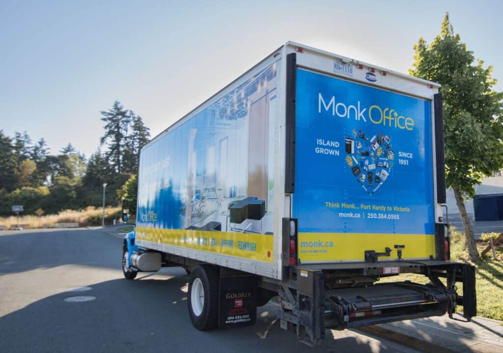 Custom vehicle wrap for Monk Office promoting their services in Victoria.