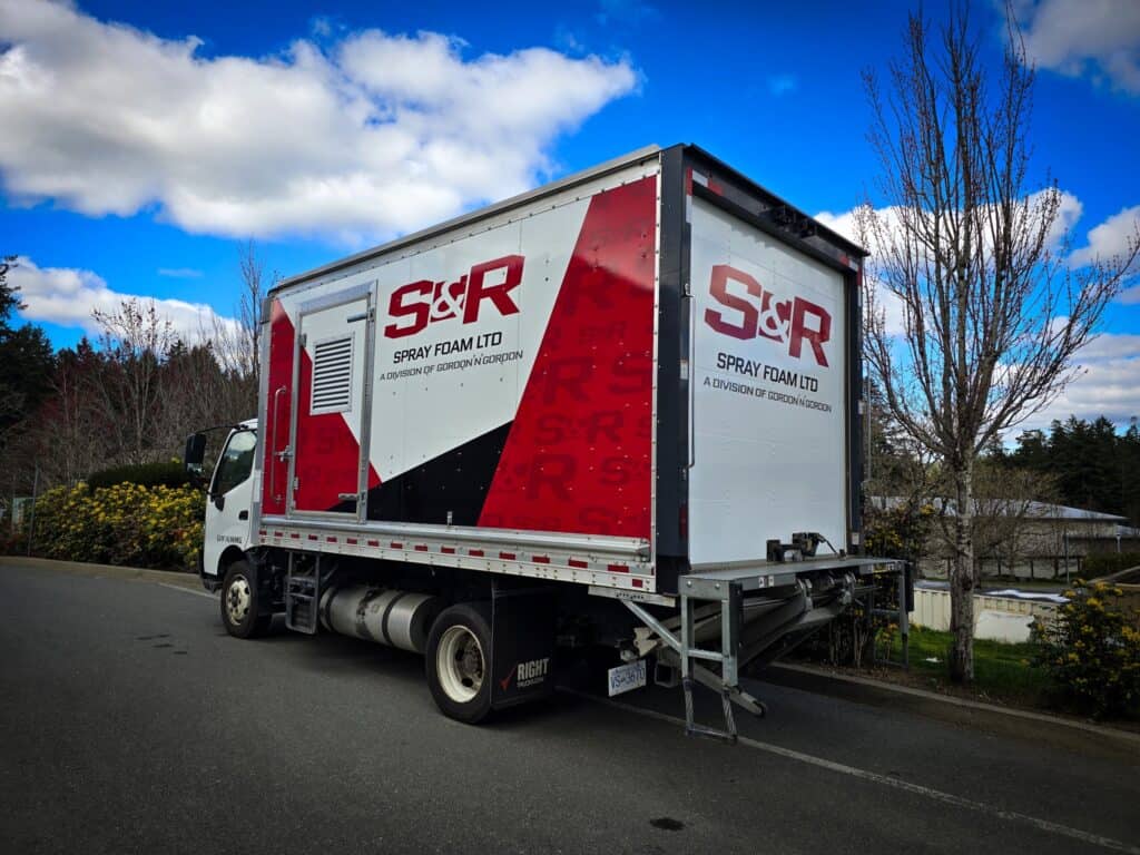 Spray foam truck with S&R branding, showcasing custom vehicle wrap design in Victoria.