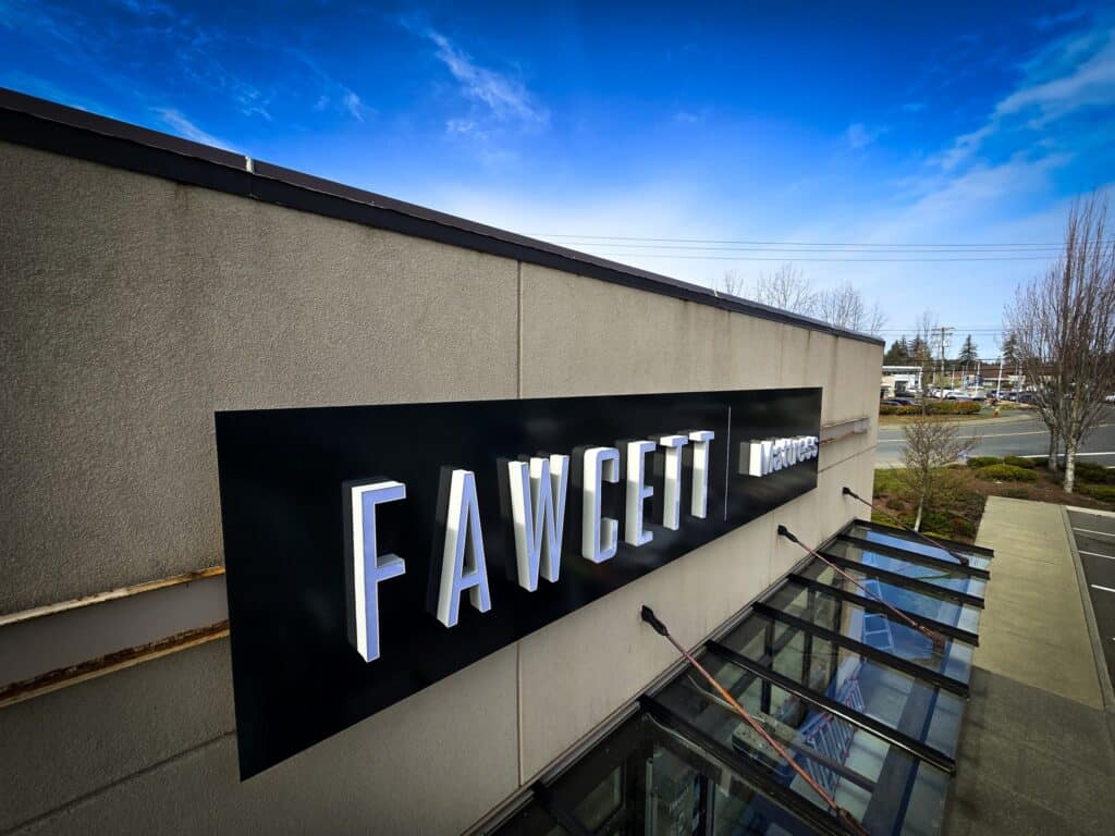 Custom Fawcett Medical sign on building exterior in Victoria.