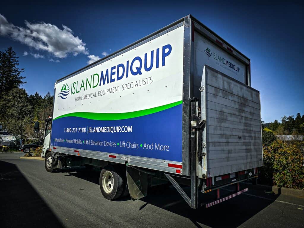 Island Medquip vehicle wrap with company branding and contact info.