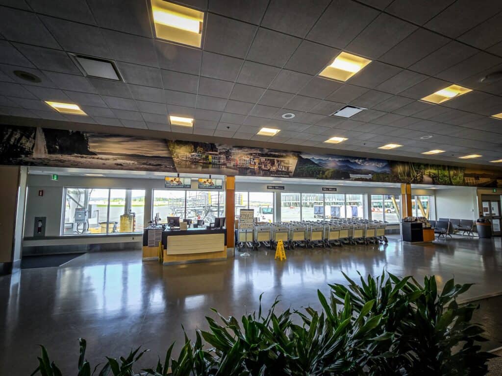 Sign pad for passenger check-in at Victoria Airport.