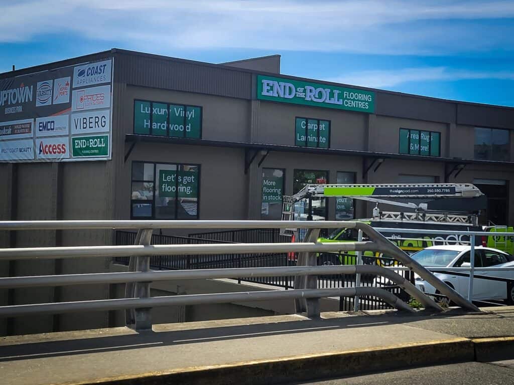 End of Roll Flooring Centre sign on commercial building.
