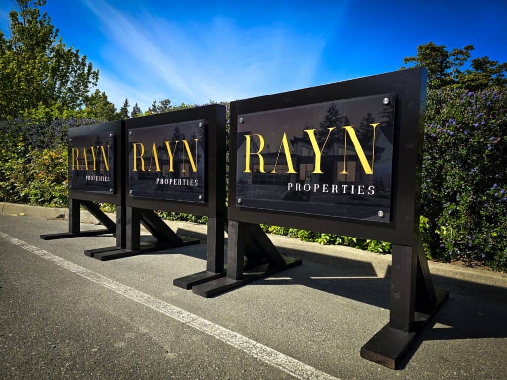 Custom RAYN Properties sign for business branding in Victoria.