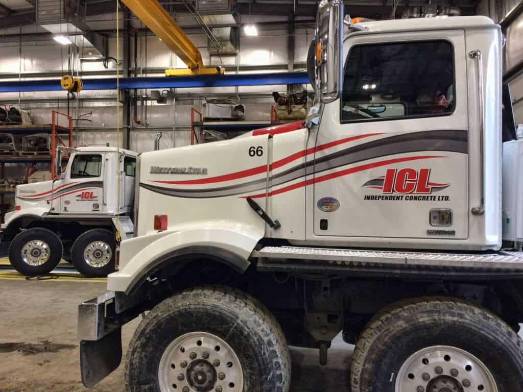 Vehicle wrap featuring the ICL logo on a concrete truck.