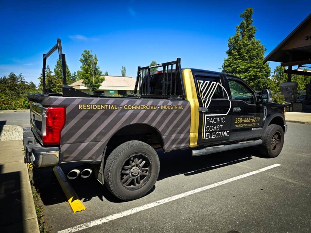 Vehicle wrap featuring company branding for Pacific Coast Electric.