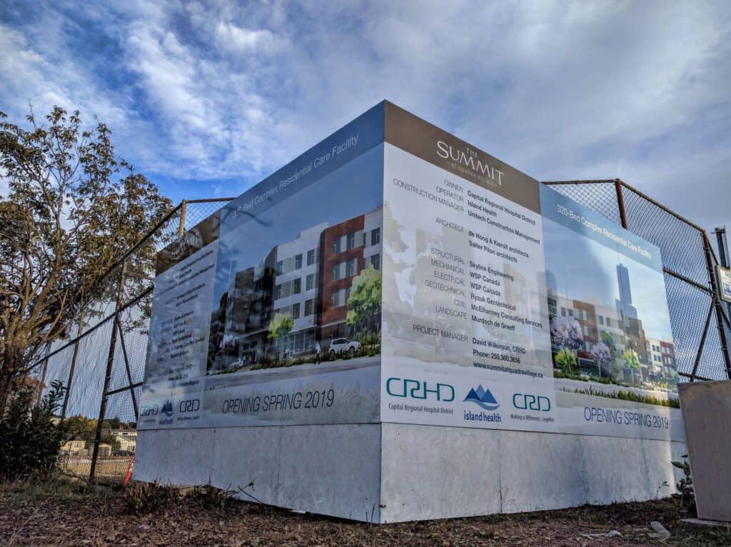 Large outdoor sign for Summit Medical Care Facility in Victoria.