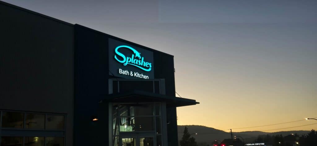 Sign for Splash Baths & Kitchen in Victoria with illuminated logo.