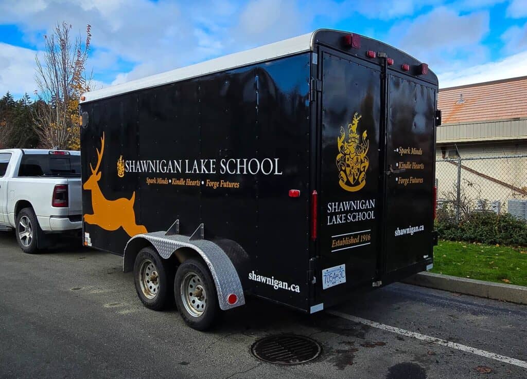 Mobile sign trailer for Shawnigan Lake School in Victoria, featuring custom graphics and branding.