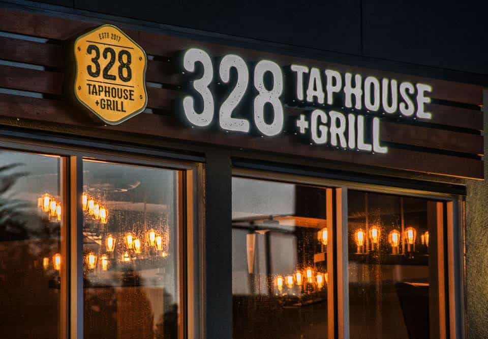 Signage for 328 Taphouse & Grill restaurant in Victoria.