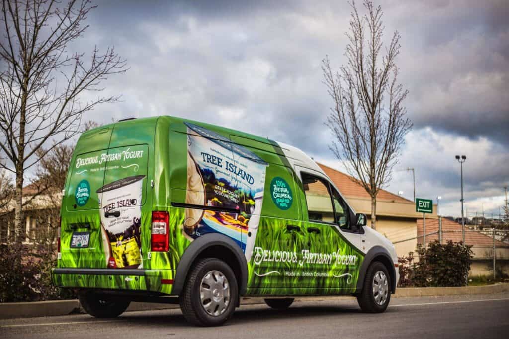 Custom Tree Island vehicle wrap promoting local business in Victoria.