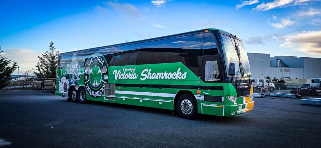 Vehicle wrap featuring Victoria Shamrocks logo and team colors.