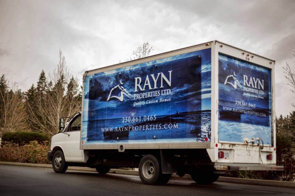RAYN Properties Ltd. custom sign and vehicle wrap in Victoria.