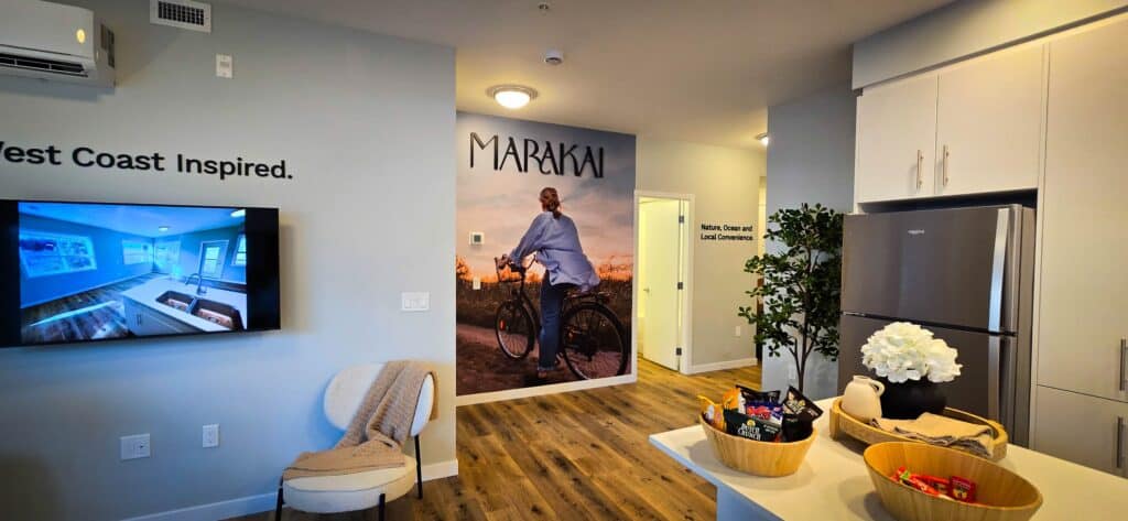 Custom signs and vehicle wraps displayed in a stylish, contemporary interior setting in Victoria.