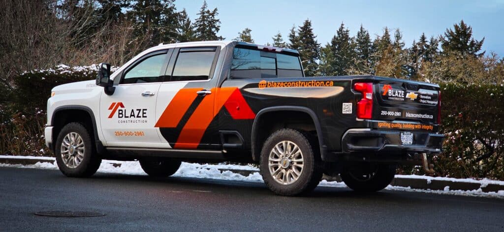 Custom vehicle wrap for Blaze Construction truck in Victoria, showcasing branding and design.