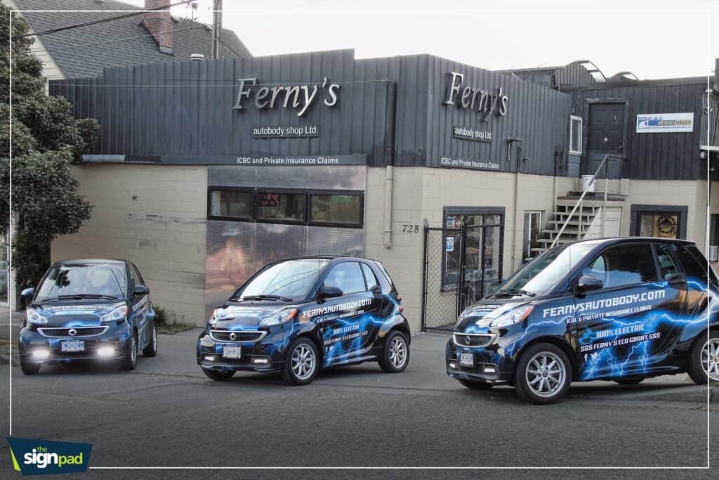 Custom vehicle wraps for Ferry's Auto Shop in Victoria, showcasing vibrant branding on fleet vehicle.