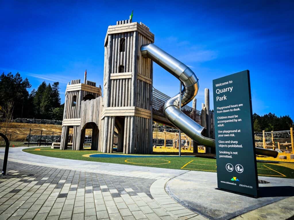 Playground castle featuring a large slide at Quarry Park in Victoria. Perfect for kids' outdoor fun.