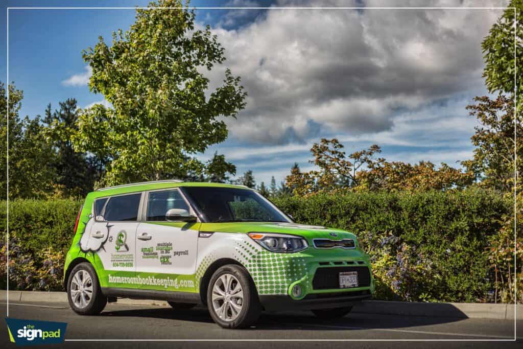 Electric vehicle with custom signage for eco-friendly transportation.