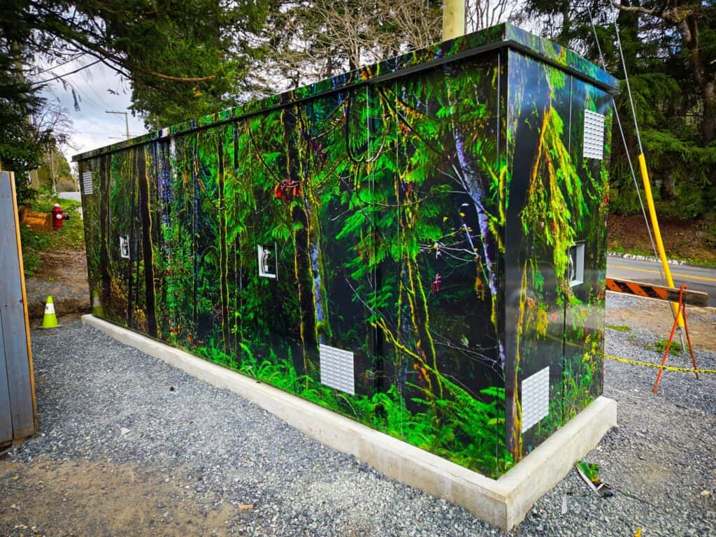 Sign pad with vibrant forest mural, used for signage and vehicle wraps in Victoria.