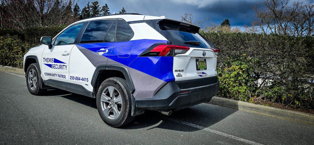 Emergency security vehicle with custom signage and wraps in Victoria, showcasing branding for securi.