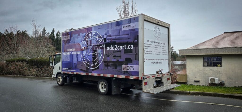 Custom vehicle wrap for moving trucks in Victoria, showcasing branding and advertising solutions.