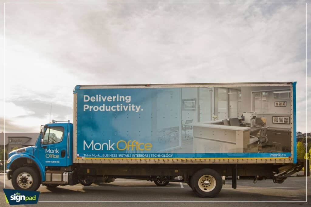 Custom vehicle wrap for Monk Office promoting productivity and technology.