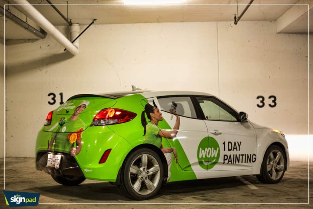Green and white vehicle wrap advertising 1-day painting service in Victoria.