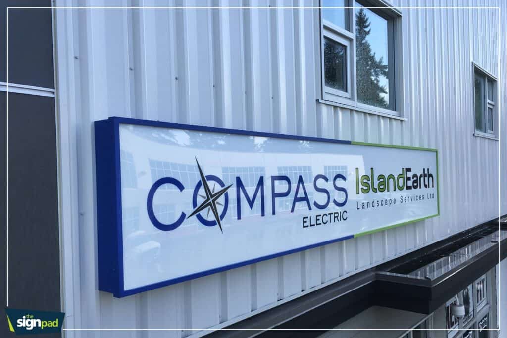 Custom outdoor sign for Compass Electric and Island Earth Landscape Services.