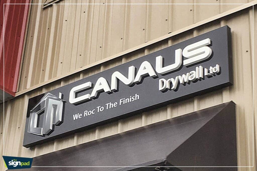 Custom Canalus drywall sign for business storefront in Victoria.