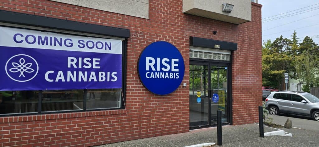 Exterior view of Rise Cannabis storefront with signage and entrance in Victoria.