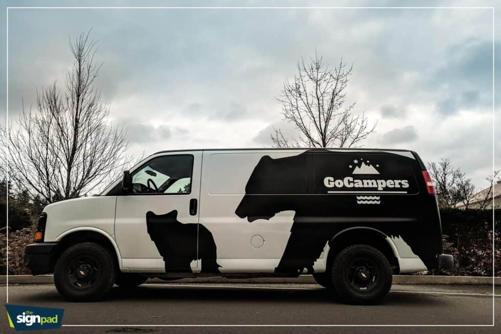 Custom black and white vehicle wrap for GoCampers on a van in Victoria.