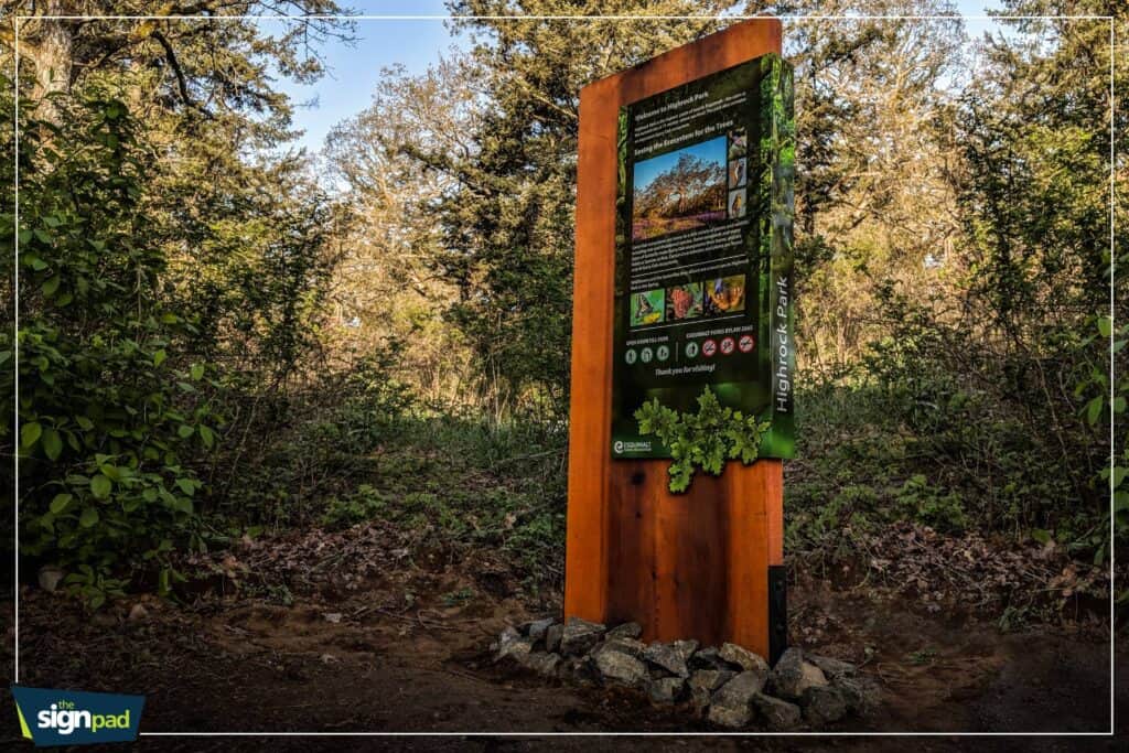 Signage board displaying information about the local nature reserve.
