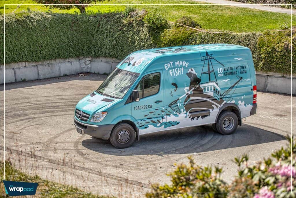 Custom fish market van wrap with aquatic design and branding.
