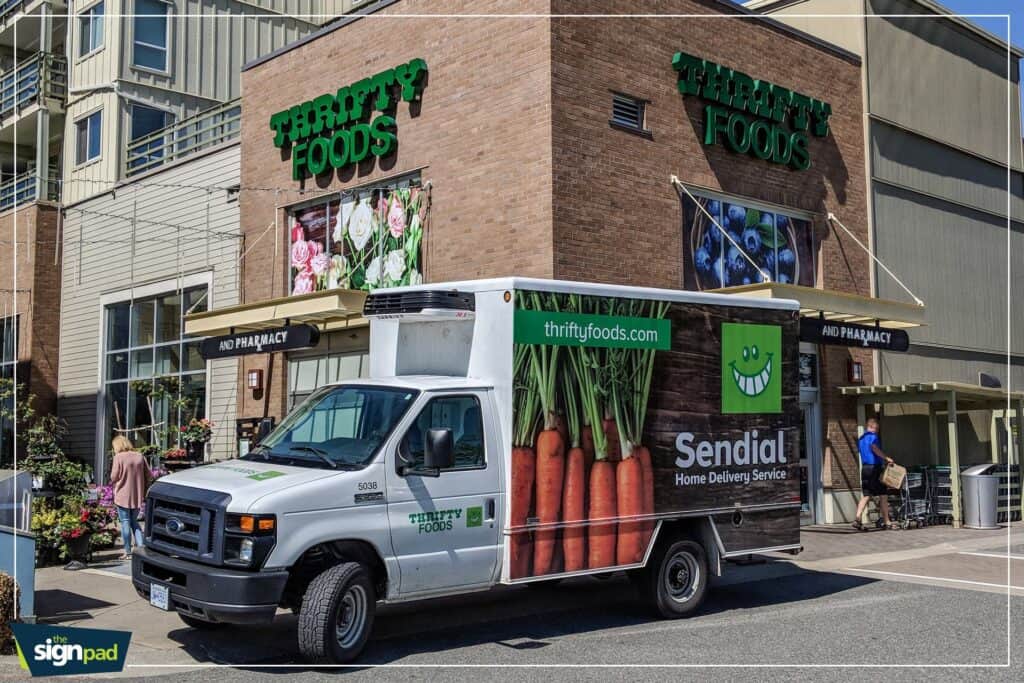 Thrifty Foods delivery truck parked outside store in Victoria.