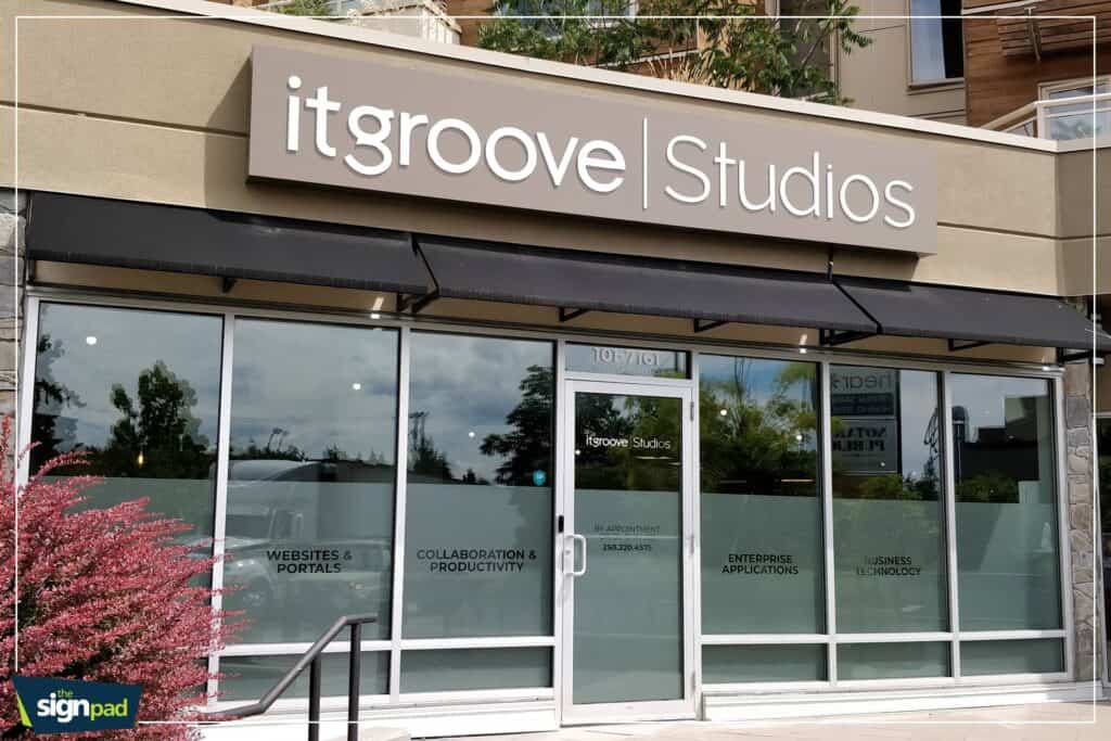 Custom sign for Itgroove Studios in Victoria, showcasing professional branding and vehicle wrap serv.