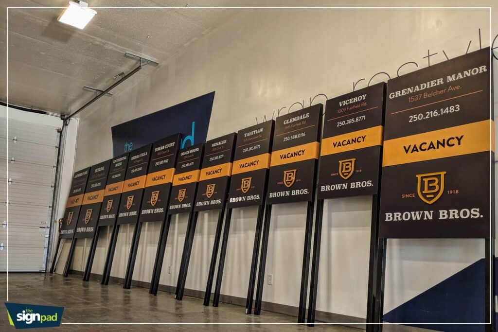 Custom signs and vehicle wraps display at The Sign Pad in Victoria.