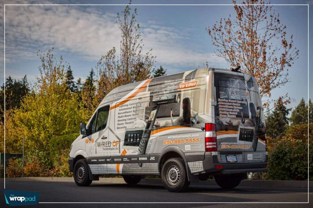 Custom vehicle wrap on a van promoting wired services in Victoria.