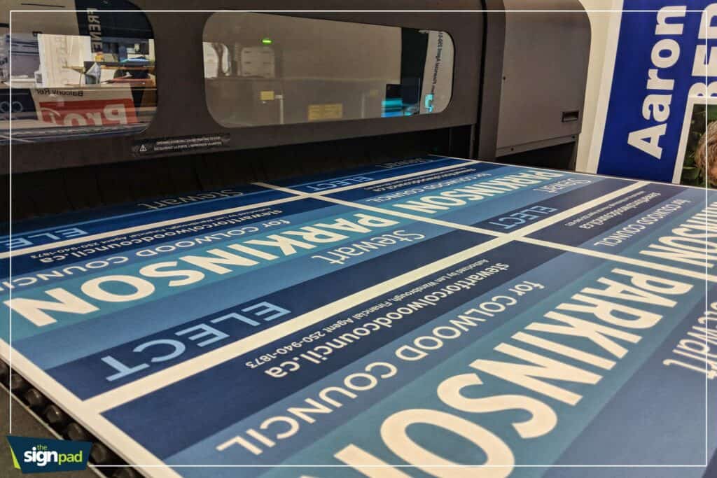 Custom vehicle wrap and sign printing process at Victoria sign shop.