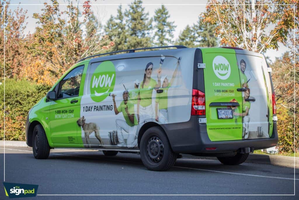 Bright green van with WOW Painting branding and custom graphics for advertising.