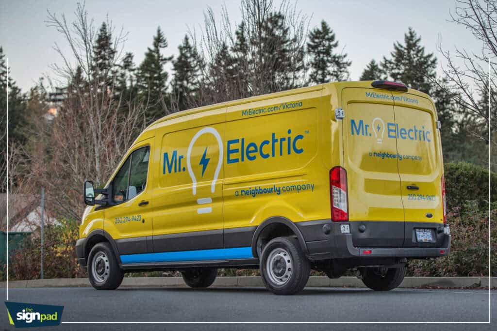 Bright yellow Mr. Electric service van with branding and contact info.