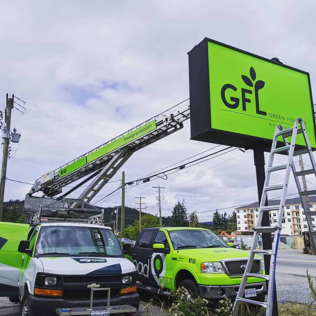 GFL Green For Life billboard with vehicle wraps in Victoria.