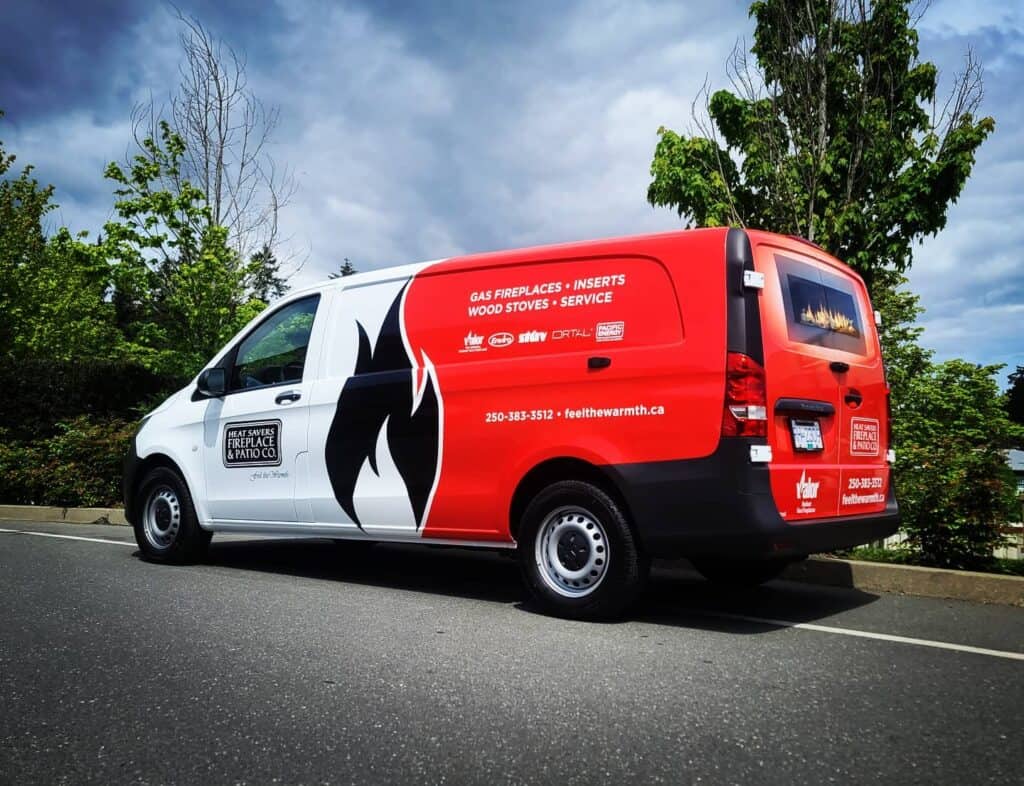 Custom vehicle wrap advertising fireplaces, gas stoves, and services in Victoria.