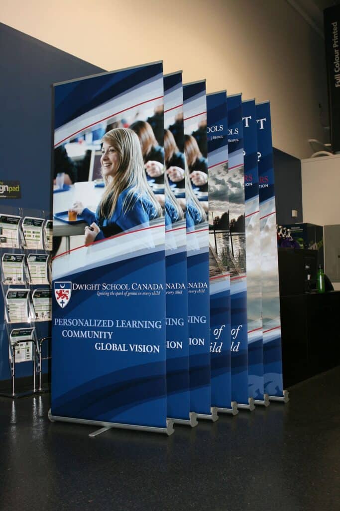 Custom signs and vehicle wraps displayed at The Sign Pad in Victoria.