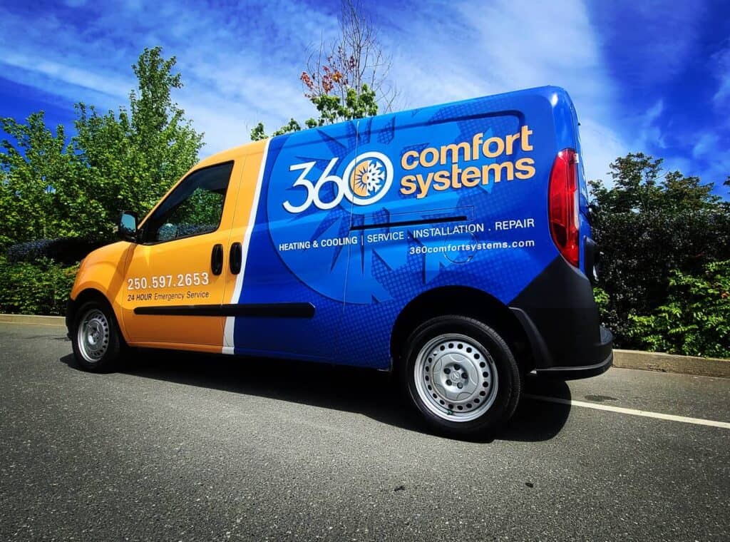 Custom vehicle wrap for Comfort Systems with branding and contact info.